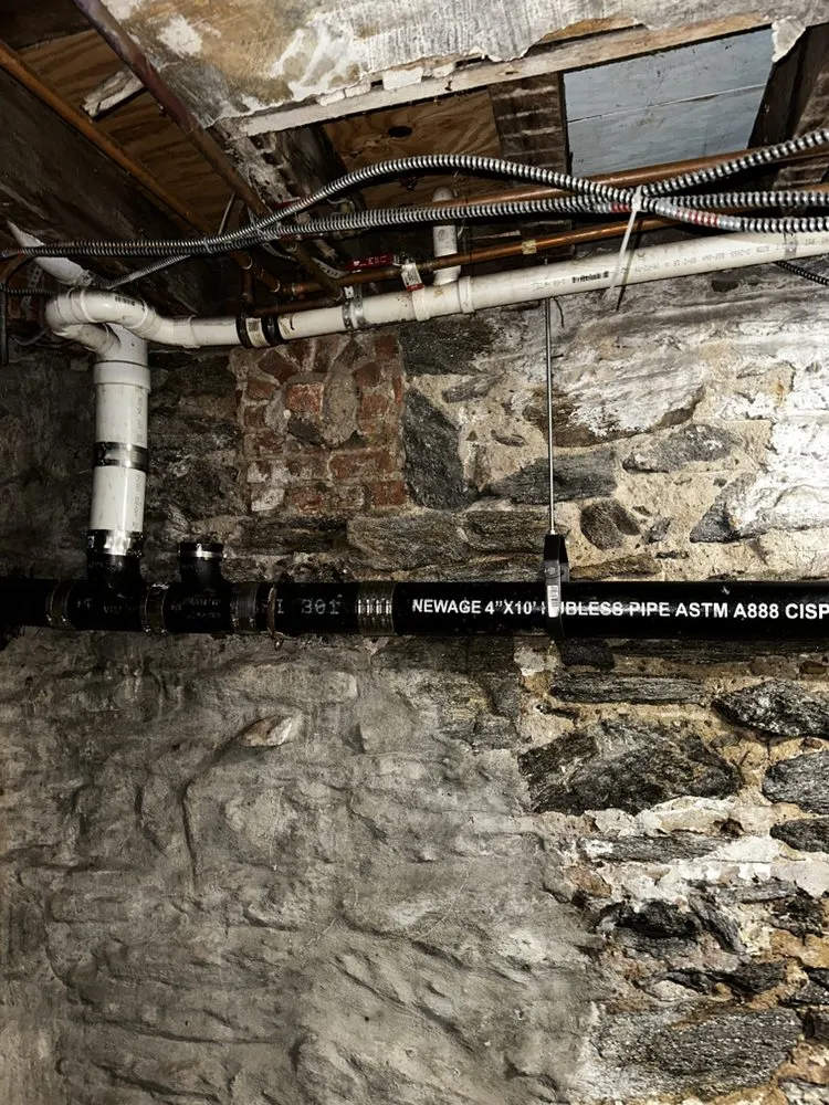 Slide of MJ Plumbing Easy Drain Solutions