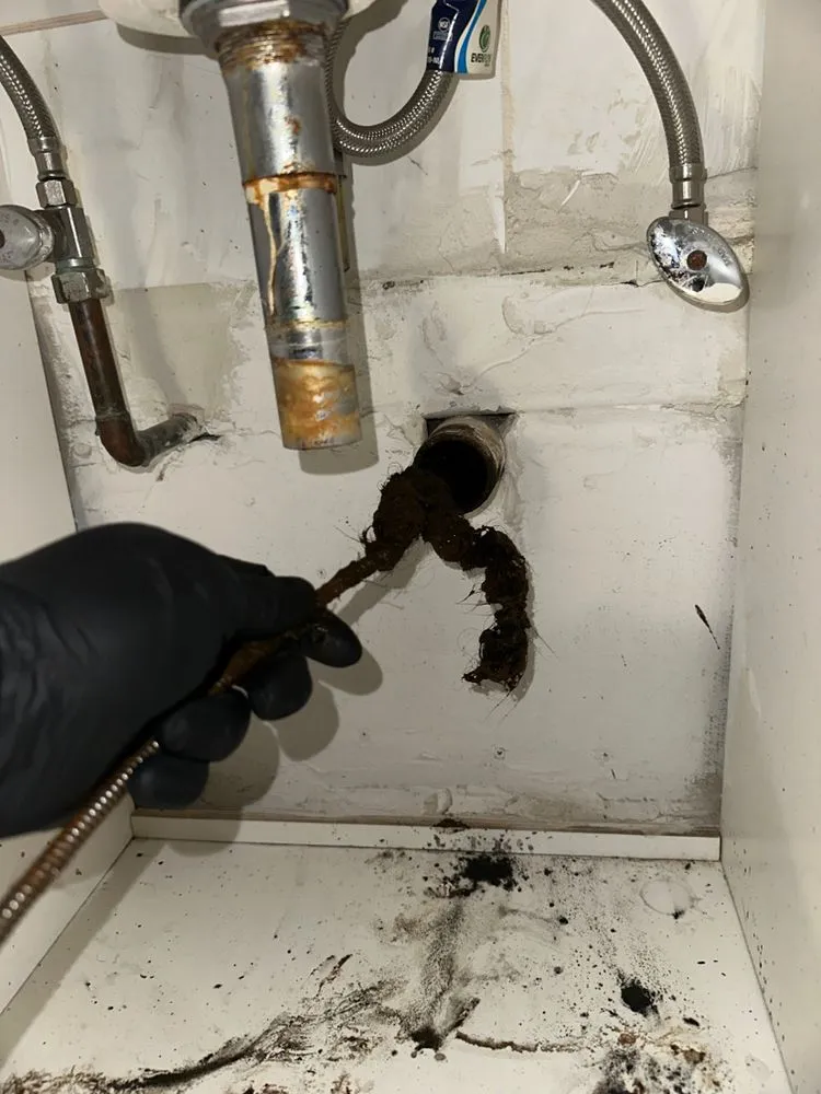 Slide of MJ Plumbing Easy Drain Solutions