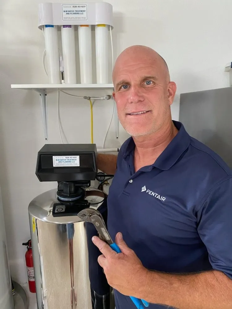 Slide of MJM Water Treatment and Plumbing