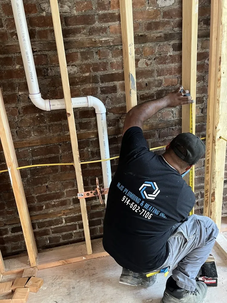 Slide of MJS Plumbing & Heating