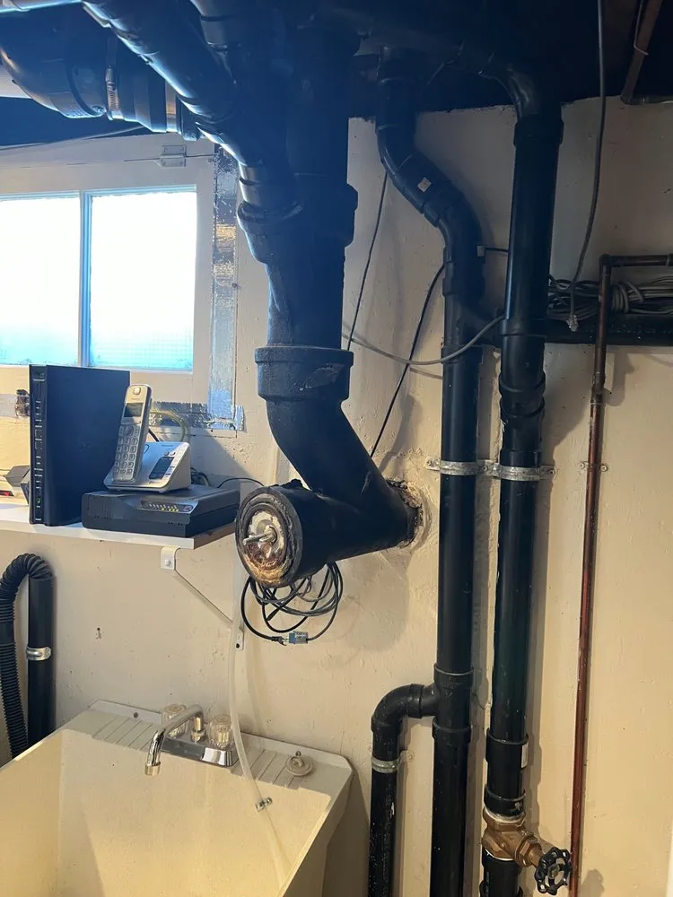 Slide of MJT Plumbing