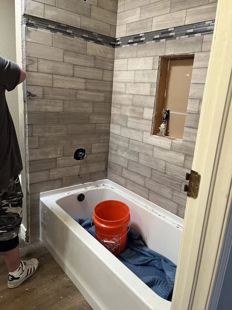 Slide of MKV Custom Remodels