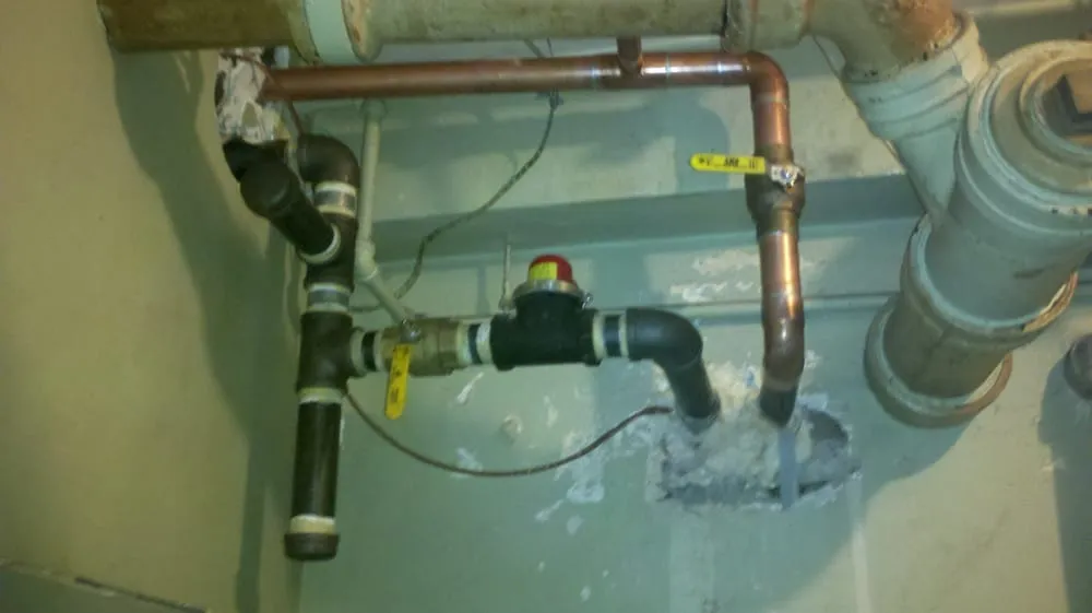 Slide of Molinas Technical Plumbing Repair