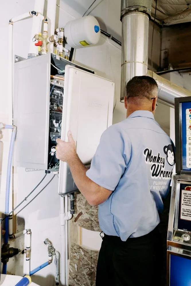 Slide of Monkey Wrench Plumbing, Sewer & Drain