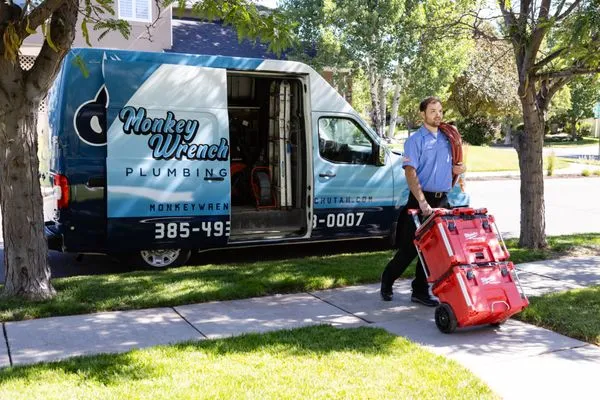 Monkey Wrench Plumbing, Sewer & Drain Logo