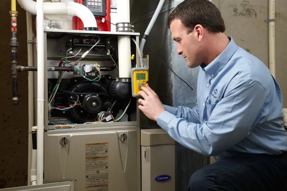Trusted water heater service in Honor, MI by Moore Mechanical Plumbing & Heating & Air