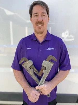 Moore Plumbing Service Logo