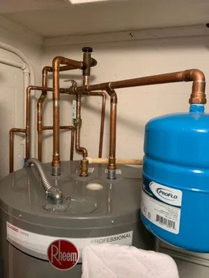 Moore Plumbing Solutions Logo