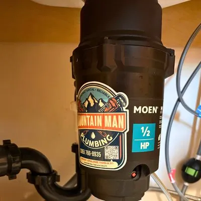 Mountain Man Plumbing Logo