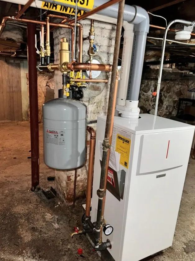 Slide of MP Plumbing and Heating