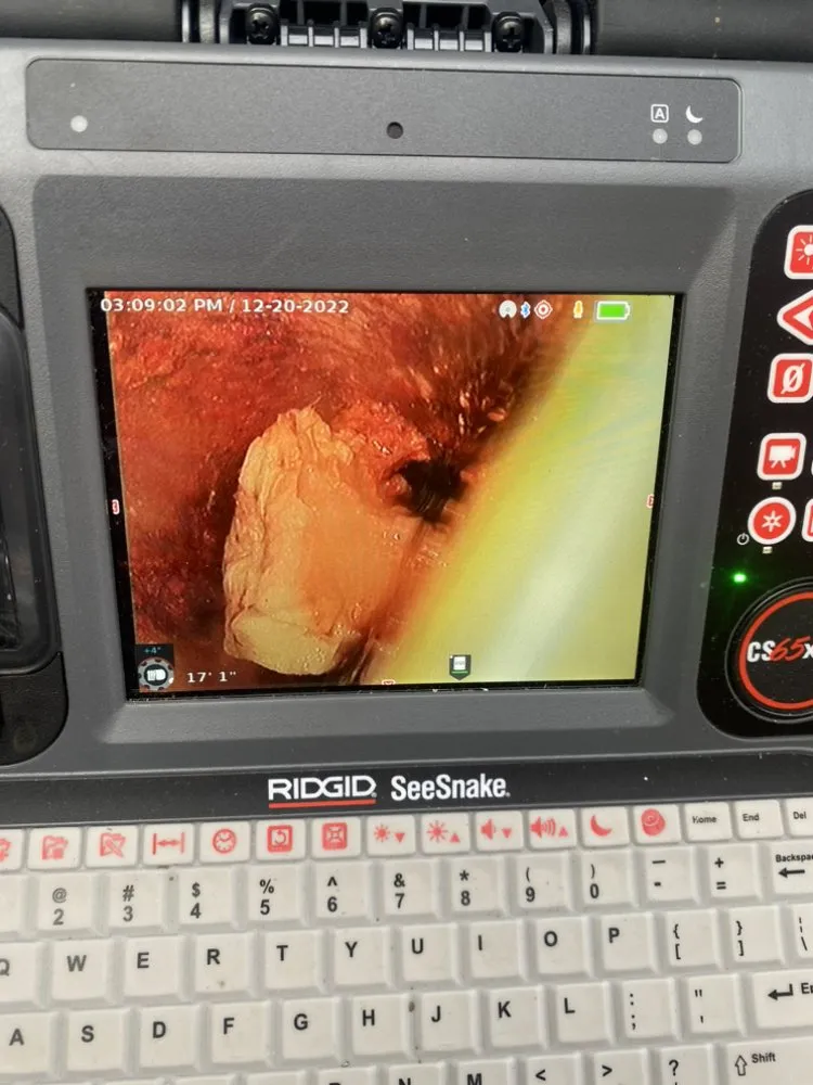 Slide of MP Plumbing Rooter