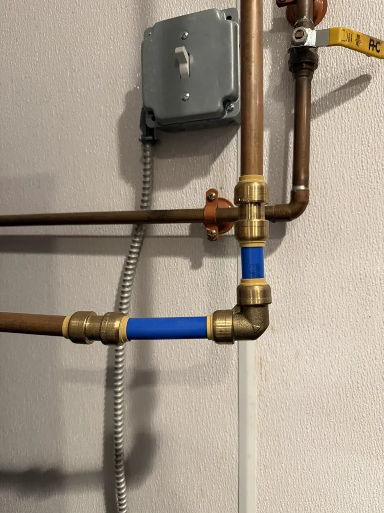 Slide of MP plumbing services