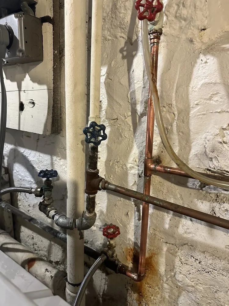 Slide of MP plumbing services