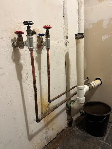 Slide of MP plumbing services