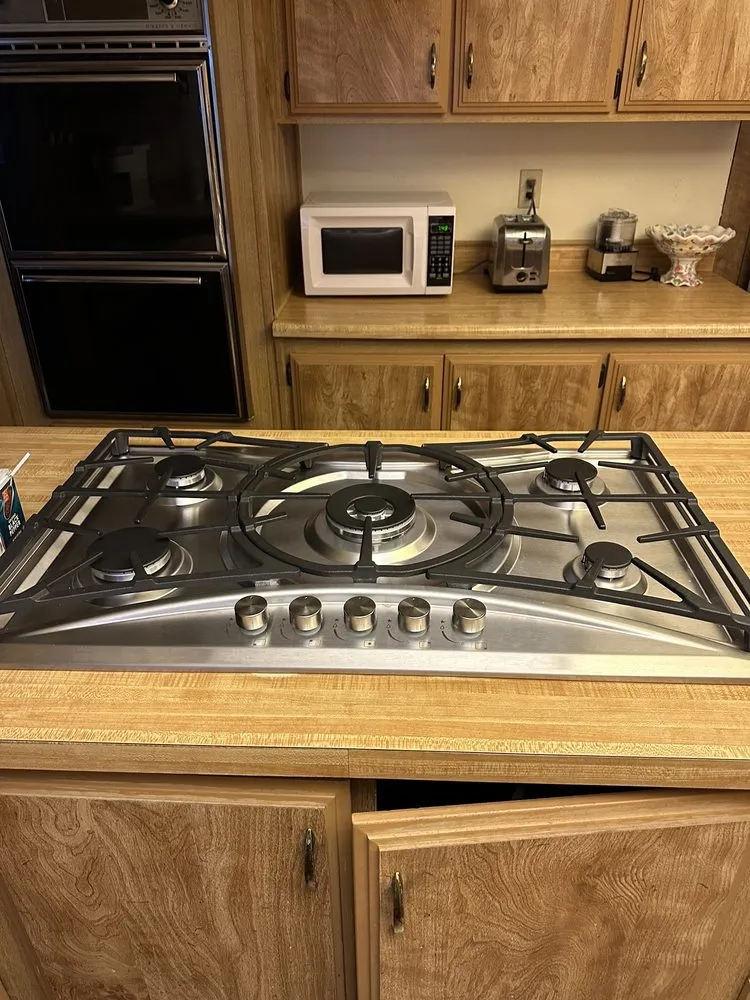 Slide of Mr Den Handyman Service