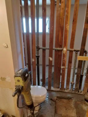 Mr. Pipe Wrench Plumbing Logo