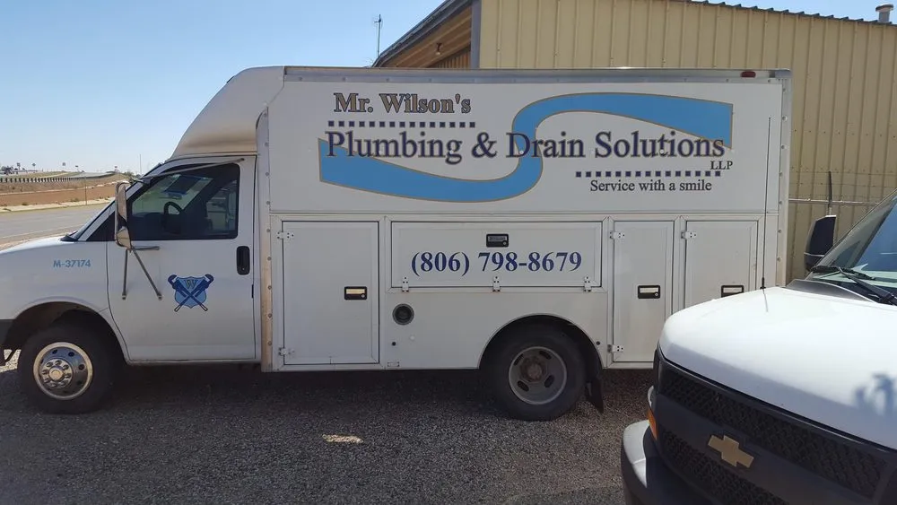 Slide of Mr Wilson's plumbing and Drain solutions 