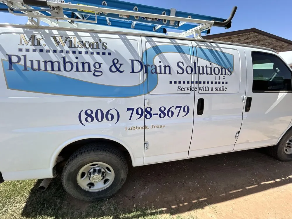 Slide of Mr Wilson's plumbing and Drain solutions 