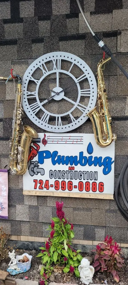 Slide of Musicks Plumbing and General Contracting