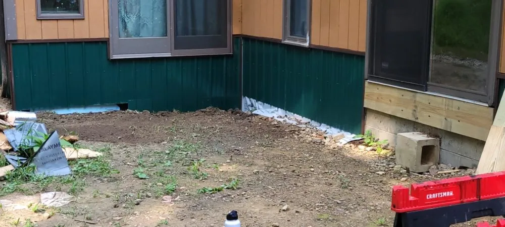 Slide of Musicks Plumbing and General Contracting