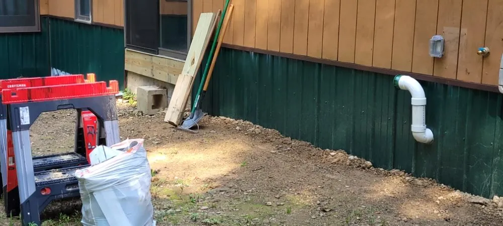 Slide of Musicks Plumbing and General Contracting