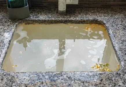 Slide of Muzzi Drain Cleaning