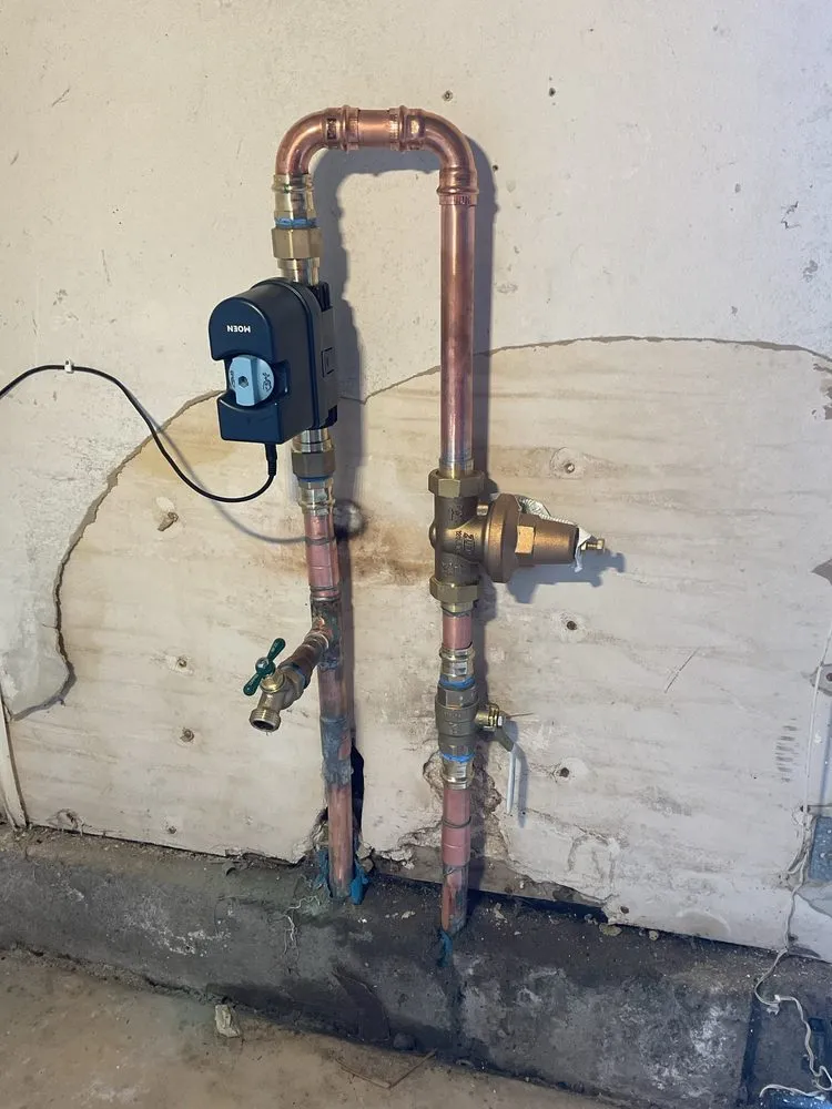 Slide of Neil and Sons Plumbing and Water Heaters