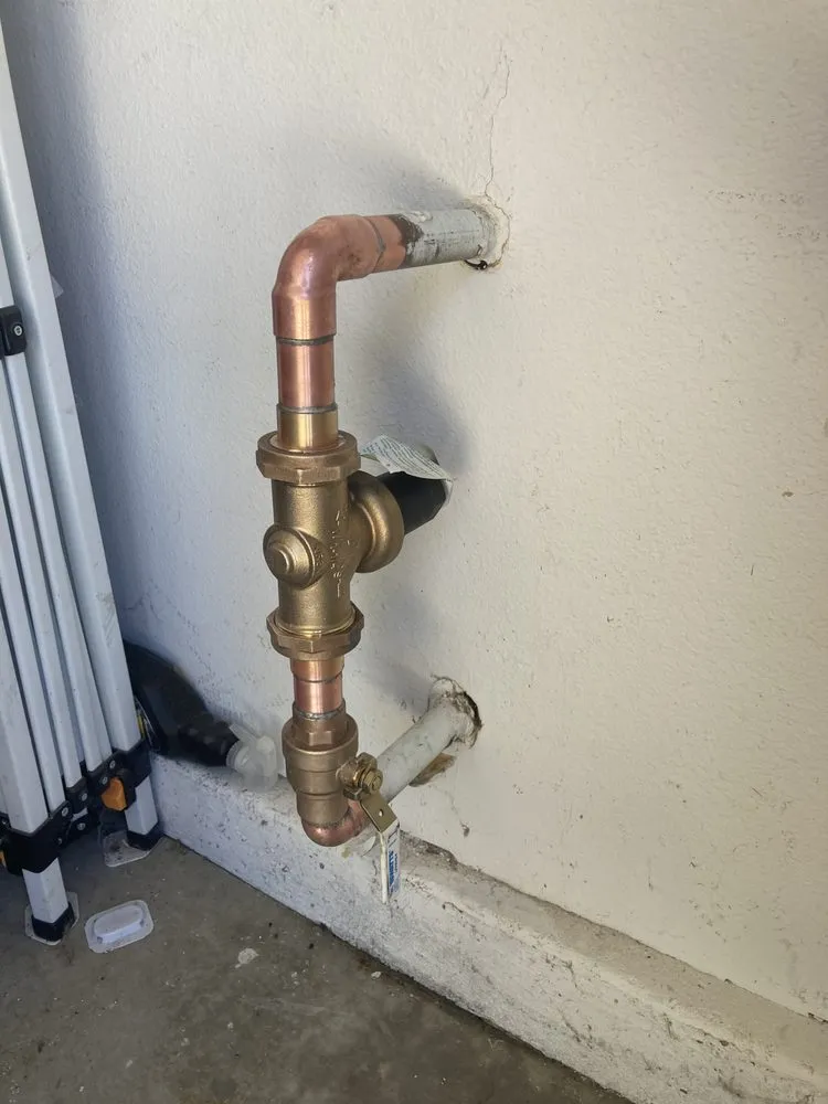 Slide of Neil and Sons Plumbing and Water Heaters