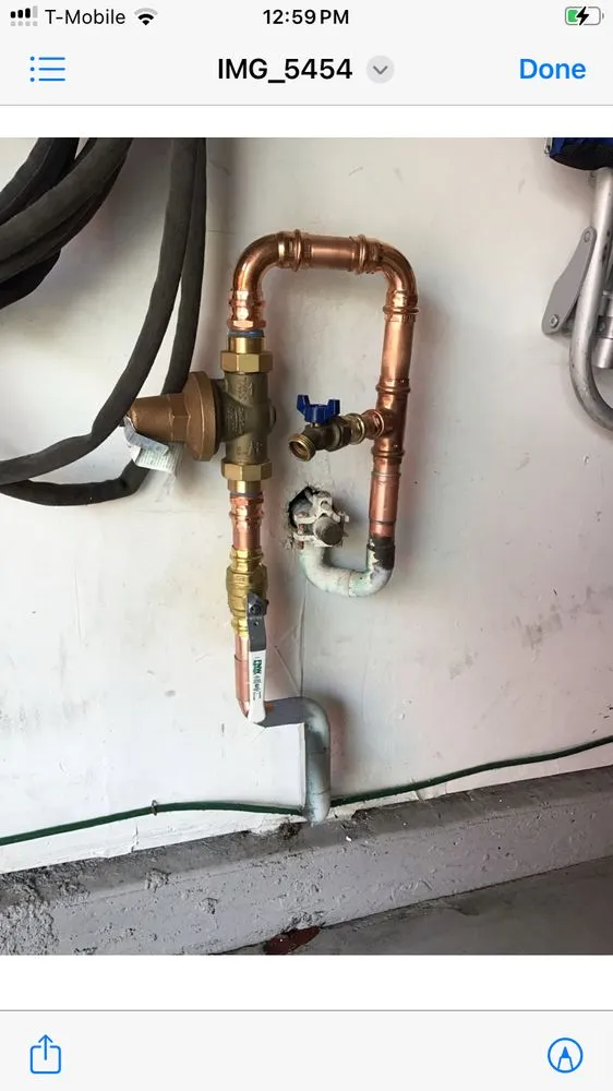 Slide of Neil and Sons Plumbing and Water Heaters