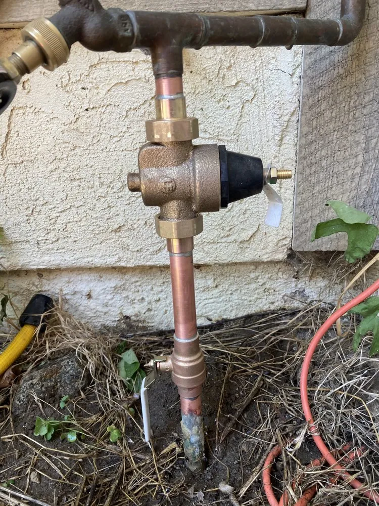 Slide of Neil and Sons Plumbing and Water Heaters