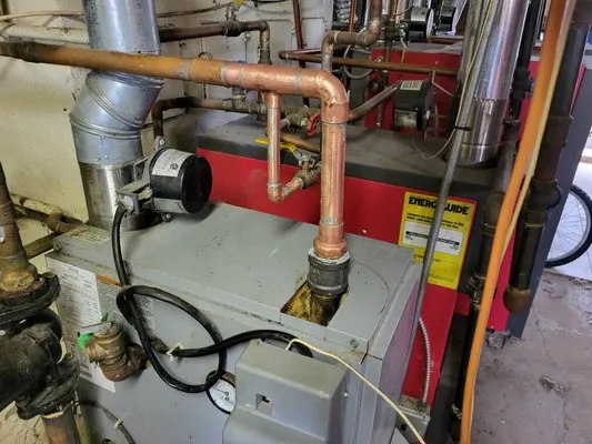 Nelco Construction and Maintenance Logo