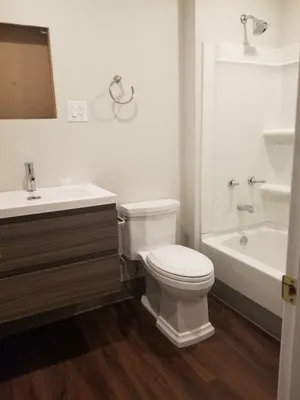 Nest Home Repair And Improvements Logo