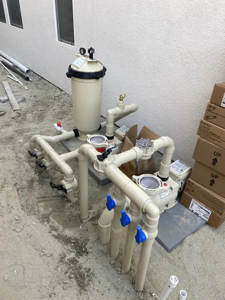 Slide of New Coast Pool Plumbing