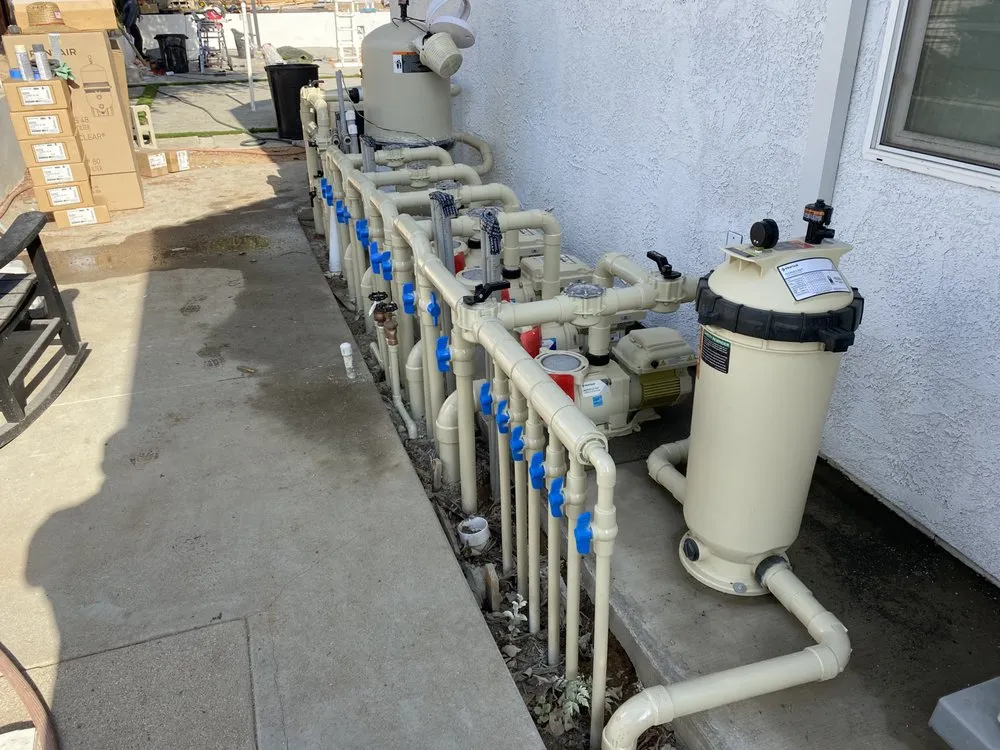 Slide of New Coast Pool Plumbing