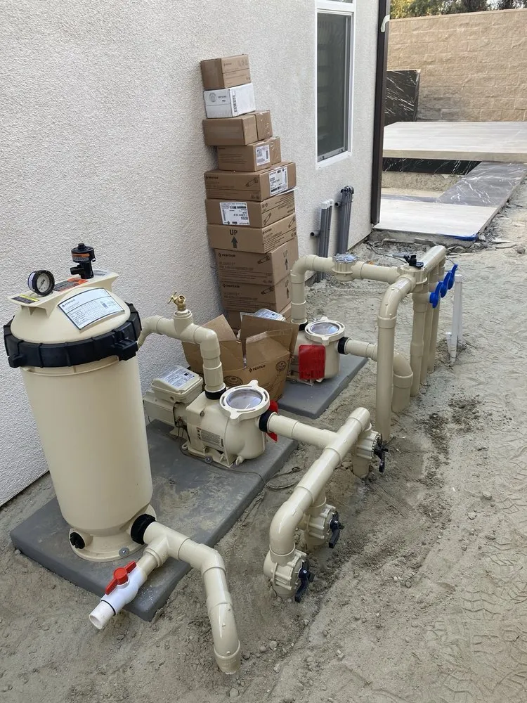 Slide of New Coast Pool Plumbing
