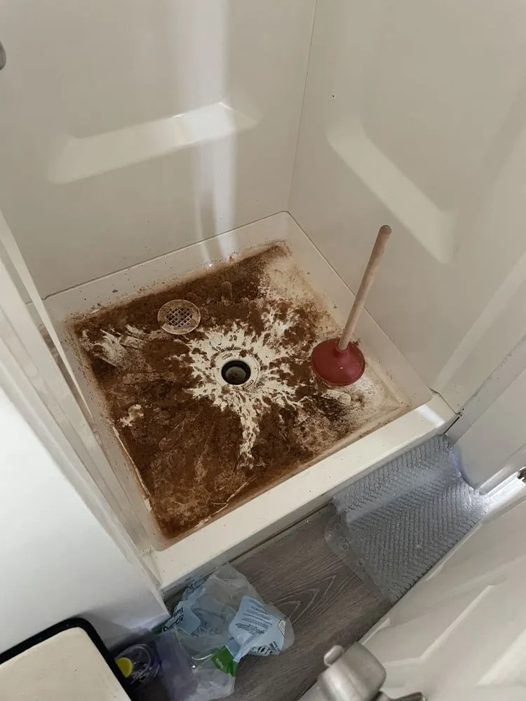 Slide of New Day Drain Services