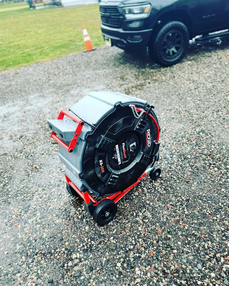 Slide of New Day Drain Services