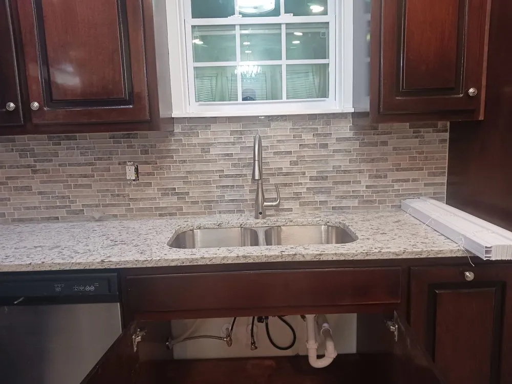 Slide of Noah's Plumb Handy Drain Cleaning