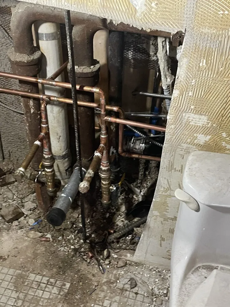 Slide of NY Pipe Repair & drain cleaning