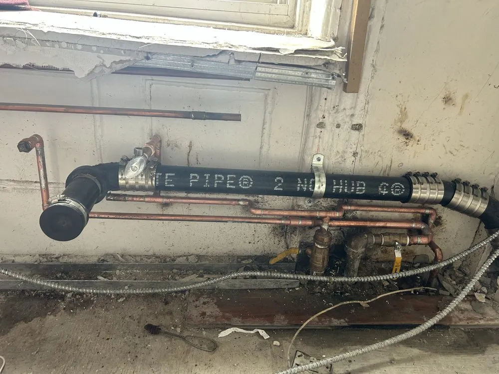 Slide of NY Pipe Repair & drain cleaning