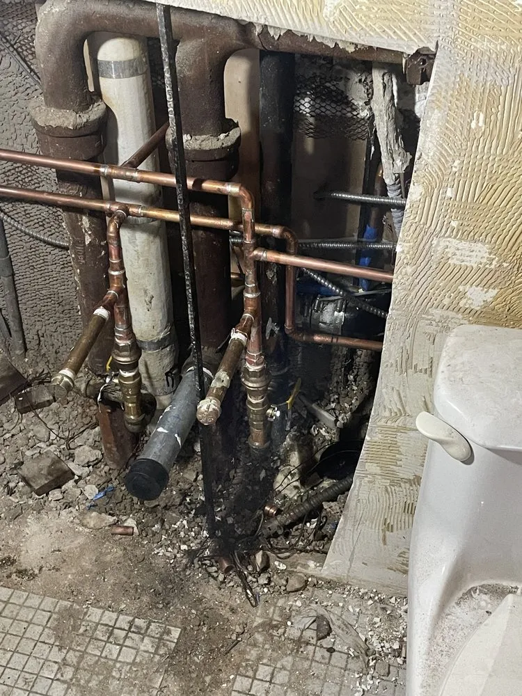 Slide of NY Pipe Repair & drain cleaning
