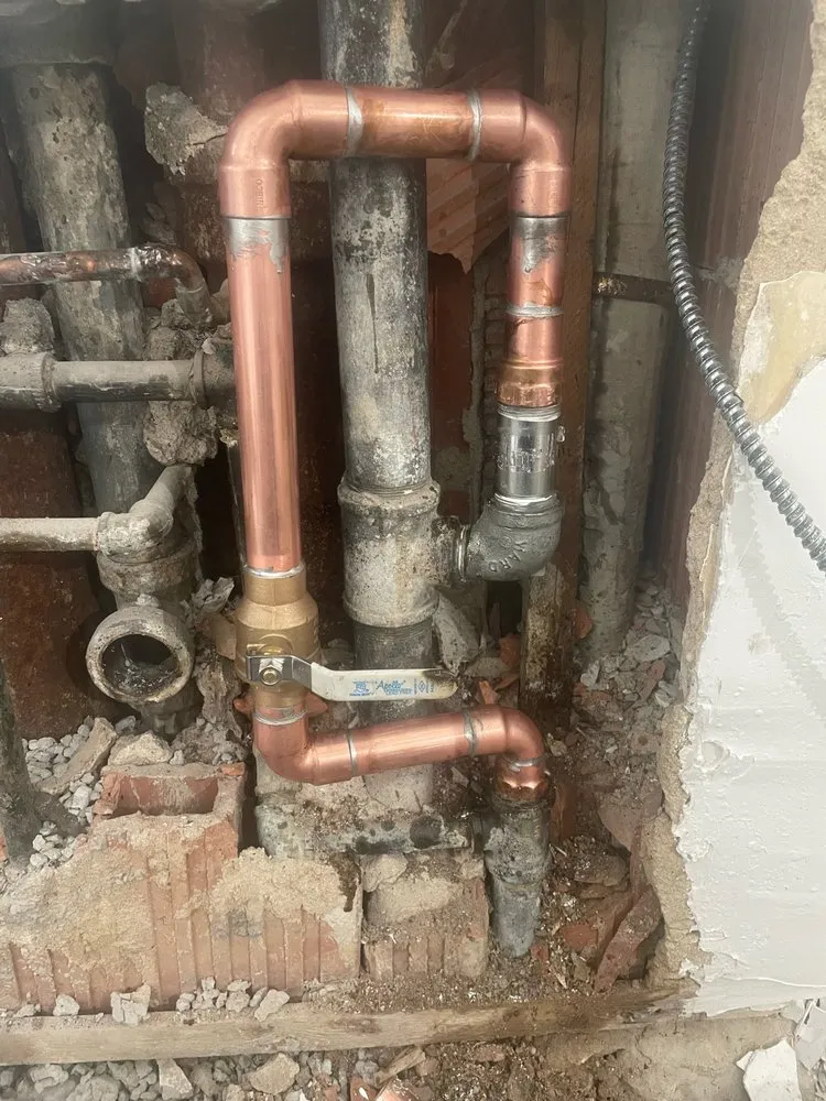 Slide of NY Pipe Repair & drain cleaning