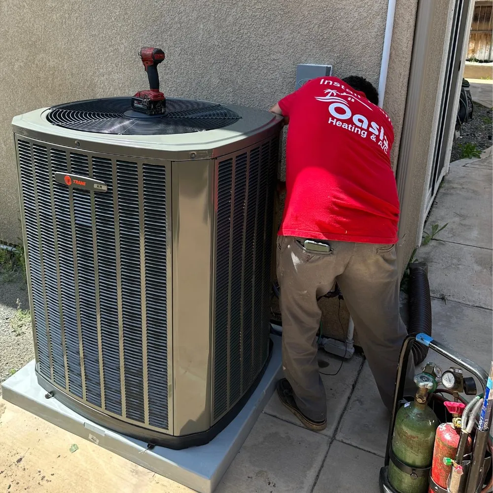 Slide of Oasis Plumbing, Heating & Air Conditioning