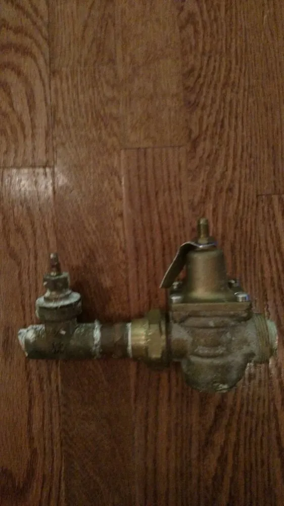 Slide of Old School Plumbing Service