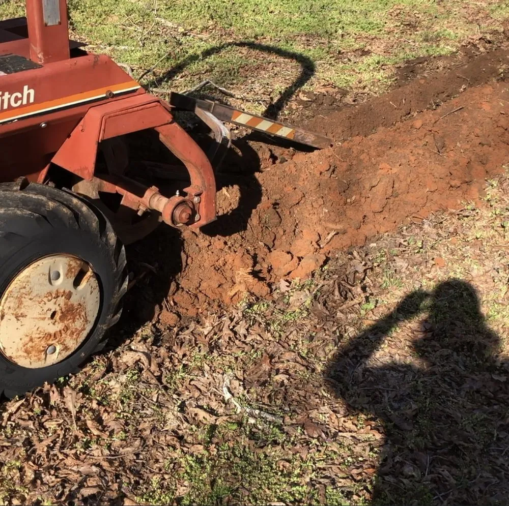 Slide of Olin's Trenching Service