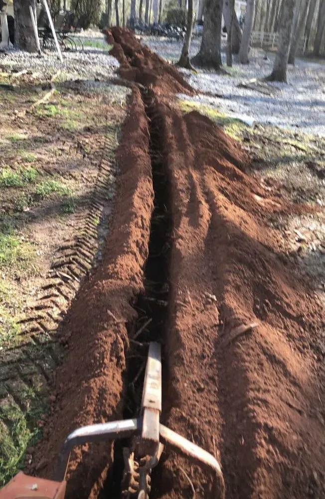 Slide of Olin's Trenching Service