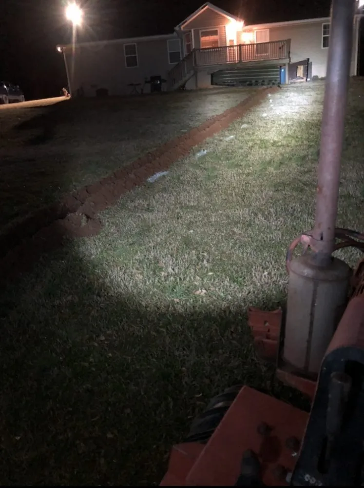 Slide of Olin's Trenching Service