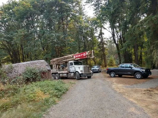 Olsen Well Drilling & Pump Service Logo