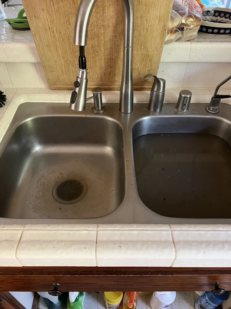 Slide of Olson's Plumbing and Rooter