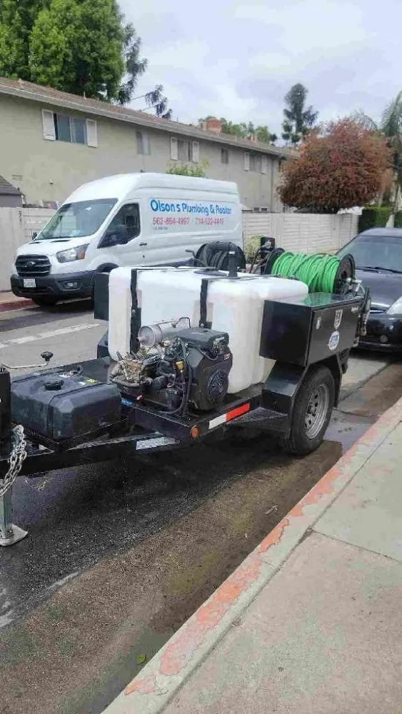 Slide of Olson's Plumbing and Rooter